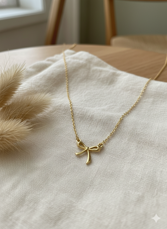 Gold bow necklace